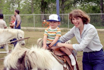 1983 - Richard riding the pony at the company picnic