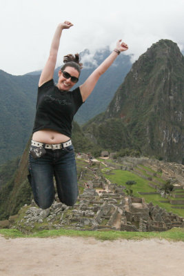 Fellow Traveler jumps for joy at Machu Picchu