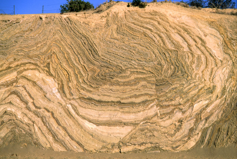 Rocks are highly distorted by movement along the San Andreas strike slip fault near Palmdale, CA