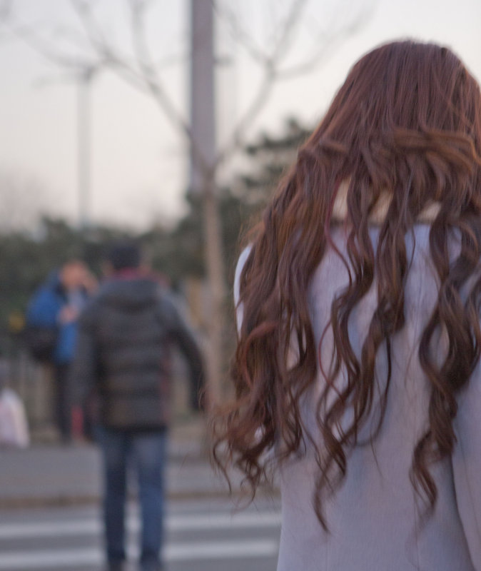 Woman in park wirth suspect hair