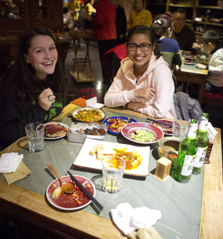 Mia and Jing Eating Dinner