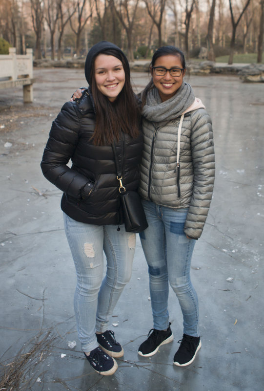 Mia and Jing on frozen pond in Ritan Park