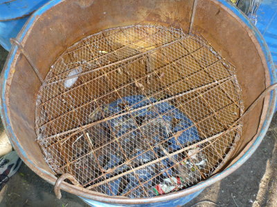 Traditional barrel smoker looking down from the top.