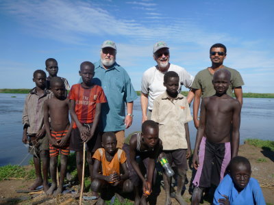 South Sudan - Me, James and Redeat with the village children along the White Nile, South Sudan.