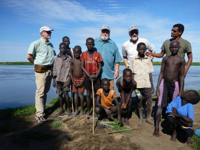 Bryce, me, James and Redeat with the village children along the White Nile, South Sudan