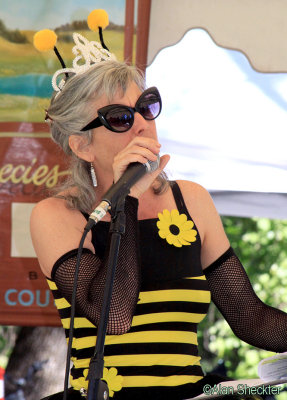 Queen Bee/Master of Ceremonies Sue Hildebrand