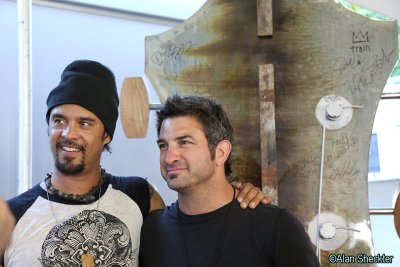 Michael Franti and sculpture artist in media tent