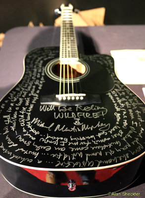 MMM guitar, with the lyrics to Wildfire.