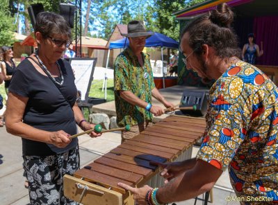 Masanga Marimba Ensemble's Joel Mankey and audience participant