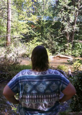 Donna looks across Millseat creek at her old childhood homestead