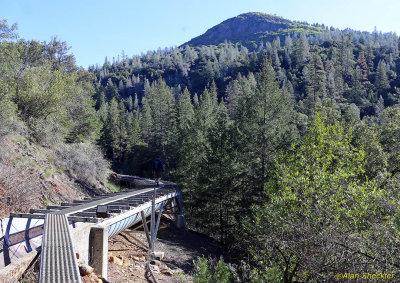 Miocene Canal trail catwalk with Sawmill Peak in the background