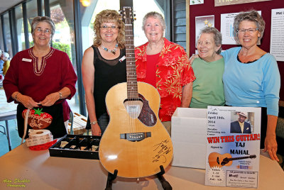  Taj-signed guitar for raffle, proceeds to go to the Paradise Ridge Senior Center