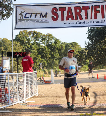 Greg and his dog, Bridger, from Rocklin - second person / dog team across the finish line