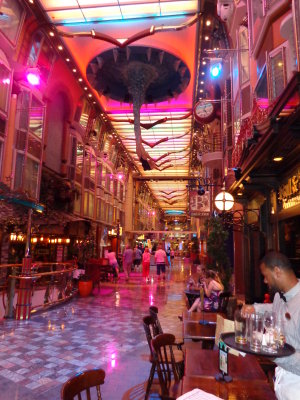 Promenade inside the cruise ship, with lots of shops & food