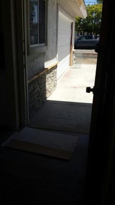 19. Remodel April 16 -looking out front door from entryway