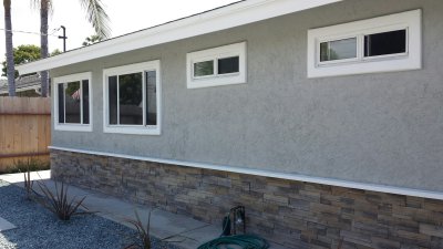 50. window stucco frames painted white