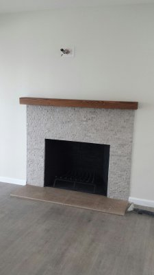 56. fireplace with wood mantle- connection for TV