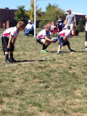 real flag football game- j receiving the ball