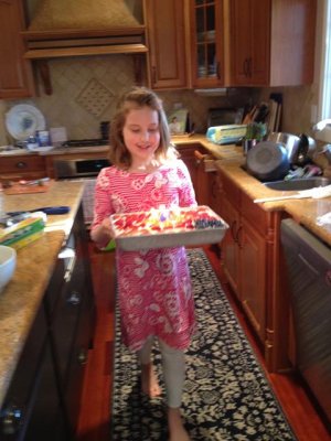 big girl helping with the cake process