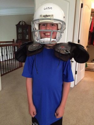 football gear -and he is going to run with that on, how?