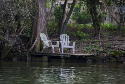 chairs by the river