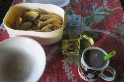 Breakfast at Hauta village - fried cassava and instant coffee.