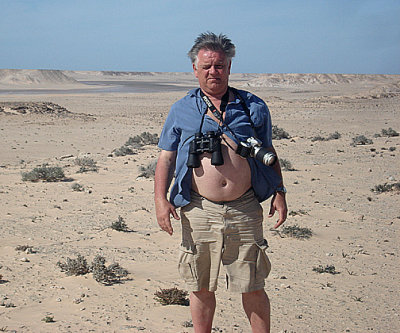 ME AT THE THICK BILLED LARK SITE . THE AOUSSARD ROAD . WESTERN SAHARA . 7 / 3 / 2010