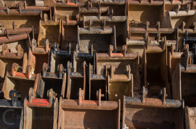 A collection of digger buckets