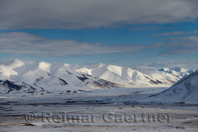 Snow covered Brooks Range mountains Alaska from the Dalton Highway