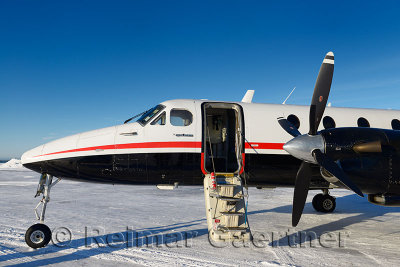Empty Beechcraft turboprop aircraft at Barter Island LRRS airport at Kaktovik Alaska