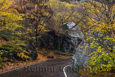 The peak of Highway 108 through boulders at Smugglers Notch State Park Vermont