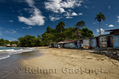Shanty shack gift shops on the beach of Maimon Bay Puerto Plata Dominican Republic