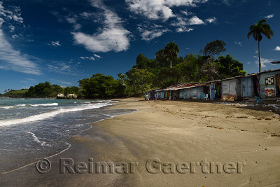 Shanty gift shops on the beach beside Riu hotels Puerto Plata Dominican Republic