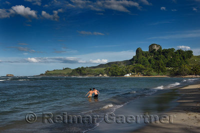 Couple wading in the ocean at Maimon Bay Riu Resorts Dominican Republic