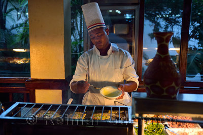 Chef making omelettes for breakfast at Riu Merengue Resort Hotel Dominican Republic