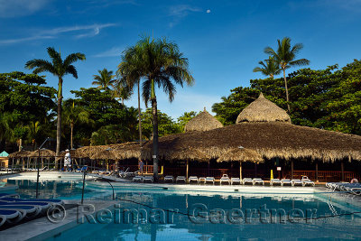 Resort Hotel pool and bar in the morning with moon Puerto Plata Dominican Republic