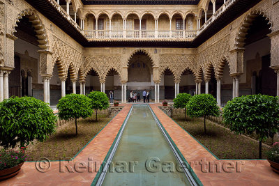 Reflecting pool in the Courtyard of the Maidens at Alcazar palace Seville Andalusia