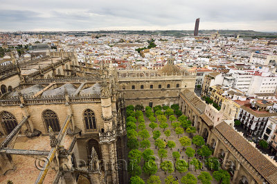 View west of Cajaso tower and bullring from Seville Cathedral Giralda showing roof with flying buttresses