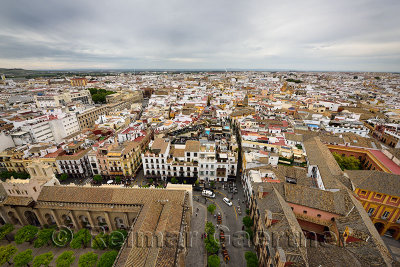 View north to Metropol Parasol from Seville Cathedral Giralda with roof of Archbishops palace and orange courtyard