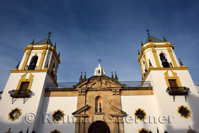 Parochial Center with twin bell towers at sunset in Ronda Andalusia Spain