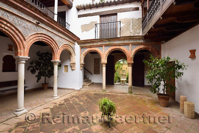 Mudejar design in open courtyard at Mondragon Moorish Palace and Ronda Museum Andalusia Spain