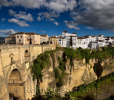 Clouds over El Tajo Gorge on the Guadalevin river with new bridge at Ronda Spain
