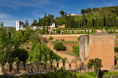 Alhambra crenellated parapet and Tower of the Judge with Medieval walkway to the Generalife Granada Spain