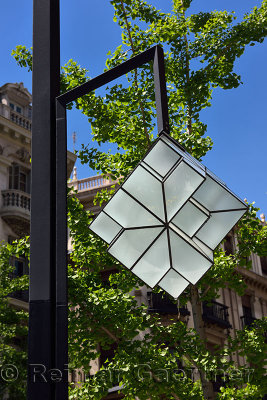 Modern street lamp on Gran Via Colon at Queen Isabella plaza Granada Spain