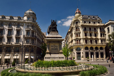 Landmark urban square with bronze sculpture of Queen Isabella and Christopher Columbus Granada Spain