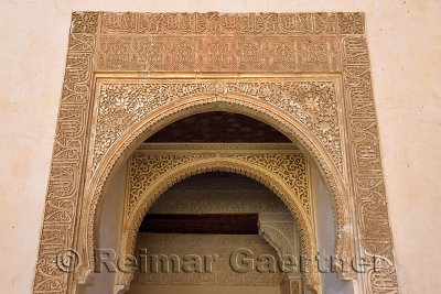 Keyhole arabic arched doorway at the court of Myrtles Comares Palace Nasrid Alhambra Spain