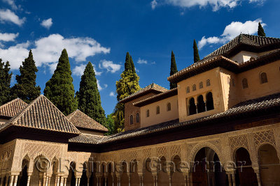 Inner courtyard of the Lions with stilted arches of Nasrid Palaces Alhambra Granada