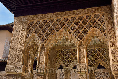 Arabesques and Mocarabe Stalactites at the courtyard of the Lions at Nasrid Palaces Alhambra Granada