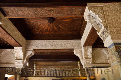 Ornate ceiling and columns of Mexuar throne room in Comares Palace of Nasrid Alhambra Granada