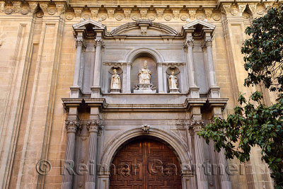 Church of the Sanctuary facade with Saint Peter over the front door Granada Spain